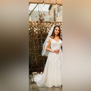 Long sleeve Stella York wedding dress